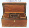A superb example of an exceptionally fine George III three compartment tea caddy in exotic partridgewood edged with fine lines of boxwood and ebony and a cross banding of kingwood circa 1790.