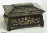 Victorian fully fitted coromandel sewing box of architectural shape inlaid with mother of pearl abalone and metal, with turned handles and feet.  circa 1845 Enlarge Picture