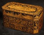 TC600: A very fine penwork tea chest, the penwork depicting scenes from the Silk Road. Inside there are two lift out tea canisters  and a cut glass Irish sugar bowl. 