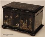 TC719: Papier mch two compartment tea caddy  exquisitely decorated with oriental scenes in mother of pearl and gilding, the inside with supplementary lids.  The lock stamped with 