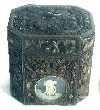 A late 18th century rolled paper tea caddy.
