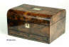 A richly figured burr walnut dome top box with liftout tray and  sprung drawer fitted for jewelry. circa 1860.
