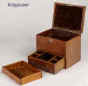 JB228:  A small mahogany box edged with boxwood, fitted for jewelry with lift out tray (later) and lower drawer having a working lock and key circa 1840. Enlarge Picture