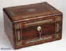  JB302: Antique figured rosewood box with rounded edges, inlaid to the top and front with fine inlays of mother of pearl and white metal depicting stylized curved foliage, the box  having a liftout tray, a separately locked side drawer fitted for jewelry, and  in the lid a document wallet with gold tooling and velvet. The box was made by T. Dalton, Manufacturer, 65 the Quadrant, Regent Street, London, Circa 1835.  Enlarge Picture