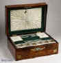 JB304: A mid Victorian rosewood box inlaid with mother of pearl, abalone, and metal, depicting flowers, having a fitted liftout  tray  with supplementary lids covered in green and cream silk. In the lid there is a document wallet. circa 1870 Enlarge Picture