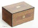 Victorian walnut veneered box inlaid in strips of geometric marquetry circa 1880