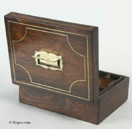 A Regency Rosewood box the top and front inlaid with brass and having a lift out tray Circa 1810
