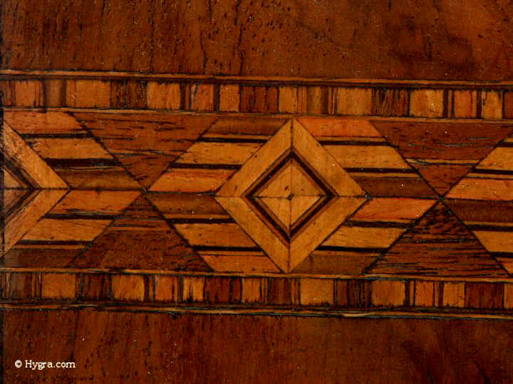 hygra.com. walnut and inlaid in strips of geometric marquetry of light and stained woods. Enlarge Picture