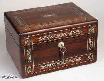  JB302: Antique figured rosewood box with rounded edges, inlaid to the top and front with fine inlays of mother of pearl and white metal depicting stylized curved foliage, the box  having a liftout tray, a separately locked side drawer fitted for jewelry, and  in the lid a document wallet with gold tooling and velvet. The box was made by T. Dalton, Manufacturer, 65 the Quadrant, Regent Street, London, Circa 1835. Enlarge Picture