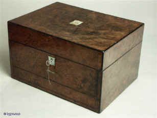  A burr chestnut box with ebony edges having a liftout tray and spring released drawer suitable for jewelry by Parkins and Gotto. Enlarge Picture