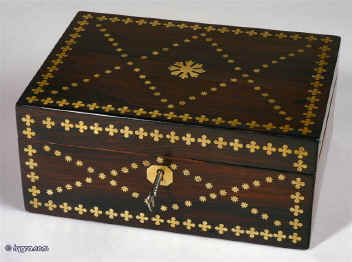 Antique Regency box inlaid with stars and quatrefoils in brass circa 1815. Enlarge Picture