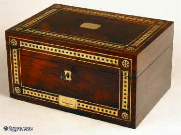 A Regency rosewood box inlaid with brass and ebony having a liftout tray and  drawer fitted for jewelry. circa 1815 Enlarge Picture