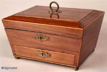 A Regency kingwood veneered box of pure neoclassical form. The gilded applied escutcheons  and handle are influenced by French work. Inside the box is lined with new velvet pads which are not glued so as to preserve the original red paper lining. circa 1810 Enlarge Picture
