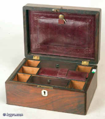 JB215: An early 19th Century box with rounded edges, original liftout tray with supplementary lids, embossed and tooled leather document wallet, the box having an inlaid mother of pearl cartouche and escutcheon and has a working lock with key, circa 1835.  Enlarge Picture