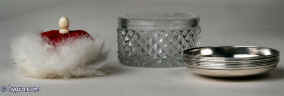 Cut crystal with silver top by George Knight of London  containing  a swan's-down powder puff: such decadent luxury! Enlarge Picture