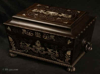 SB488: A sewing box of impressive form, decoration and workmanship, the interior lined with red silk and fully fitted with mother of pearl sewing tools, Circa 1825. Enlarge Picture
