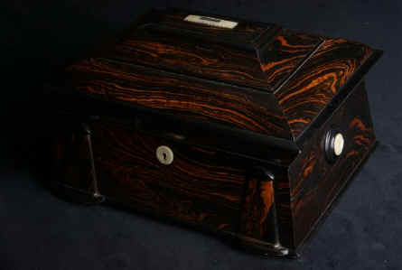 SB492: An impressive sewing box veneered in saw cut highly figured coromandel, fitted with mother of pearl sewing tools:  Enlarge Picture