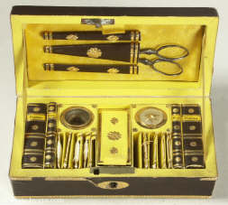 An Exquisite  yellow paper and gilt foil miniature fitted  sewing box. Circa 1800. Enlarge Picture