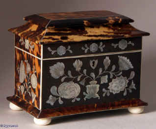 A fine  richly inlaid  twin compartment tortoiseshell tea caddy with pagoda top circa 1825. Enlarge Picture