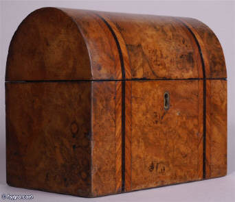 A domed top twin compartment tea caddy veneered with highly figured burr chestnut the inside with supplementary lids. Circa 1860 Enlarge Picture