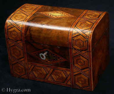 TC428: Victorian walnut veneered box inlaid in strips of geometric parquetry  circa 1880. Inside there are two compartments each with a supplementary lid. Enlarge Picture