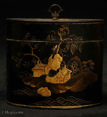  TC560:  Rare oval Japanned  toleware tea caddy decorated
            with raised chinoiserie scenes depicting pavilions in gardens in two
            colours of gold. Circa 1790. Enlarge Picture