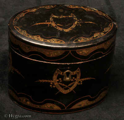 TC561:Rare 18th Century Chinese Export lacquer tea caddy of over form  with gilded decoration. Inside there is a lidded  pewter  tea canister. Circa 1780.    Enlarge Picture