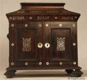 - A dramatic William IV rosewood compendium table cabinet of lofty architectural form having turned rosewood feet and handles. It is inlaid with mother of pearl and opens both to the top and the and the front and has two drawers one with a liftout tray fitted for jewelry; the upper part is also fitted for jewelry, circa 1835 Enlarge Picture