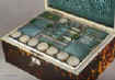 SB121: A rare fully fitted tortoiseshell sewing box of rectangular form and shaped top by Thos' Lund of Cornhill, having ivory facings, silvered hinges and lock, mother of pearl escutcheon and name plate engraved "Mrs. Brown". Inside there is a liftout tray with green and blue silk coverings  and supplementary lids  containing  turned and carved mother of pearl spools (8) and other sewing tools. The inside the lid is covered in ruched blue silk framed with a smooth silk border and contains  a document wallet in the lid. Circa 1820. Enlarge Picture