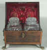 A Rare Rosewood Tea chest with twin cut crystal canisters Circa 1810. 