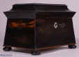 Shaped Coromandel twin compartment tea caddy  standing on turned ebony feet circa 1840 Enlarge Picture