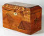 A Japanese Edo period chest made of wood veneered with different parquetry designs.