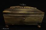 743SB: Anglo-Indian (Vizagapatam) box in wood covered in horn, of sarcophagus form, with a segmented radiating  top culminating in a turned and carved floral finial. An Indian interpretation of English Regency aesthetic. This is a small box which shows absolute mastery of design. Circa 1840.