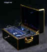 JB420: Brass bound French ebonized box by L. Aucoc aine, Paris with inlaid armorial Achievement for Bingham/ Pemburton/ Chaldicott. The box has a working Bramah lock, opening to a leather and silk covered compartmentalized interior. There are compartments and small containers which fit snugly into their allotted spaces. There is also a secret sprung drawer. Everything is covered in original leather and silk. The hinge is heavy allowing for the weight of the box. It also has the self supporting structure which helps the heavy lid stay open.  Circa 1860. Enlarge Picture