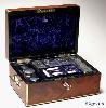 JB316: Brass edged flame mahogany fully fitted dressing box with inset brass handles and Bramah lock opening to a leather covered lift out tray with cut glass bottles with hallmarked silver tops (1827-9) a document wallet in the lid. Circa 1830. 