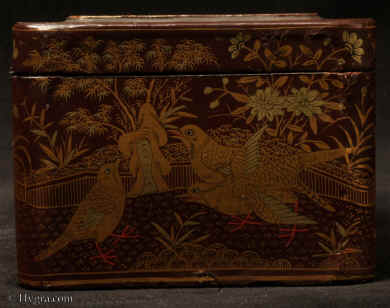 TC130:A Chinese export lacquer tea caddy in reddish earth colored lacquer having rounded corners decorated with two colors of gold depicting groups of birds highlighted in red lacquer. Circa 1840. Enlarge Picture